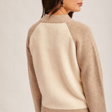 Hem and Thread Varsity Sweater