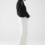 Q2 Black long sleeves sweater with sequins on the shoulders