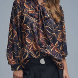 Q2 Black chiffon shirt with abstract print and knotted bow