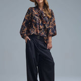 Q2 Black chiffon shirt with abstract print and knotted bow
