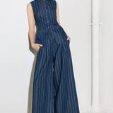 Hold Joy  in  indigo  trousers, by Flying Tomato