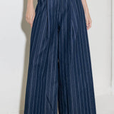 Hold Joy  in  indigo  trousers, by Flying Tomato