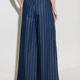 Hold Joy  in  indigo  trousers, by Flying Tomato
