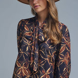 Q2 Black chiffon shirt with abstract print and knotted bow